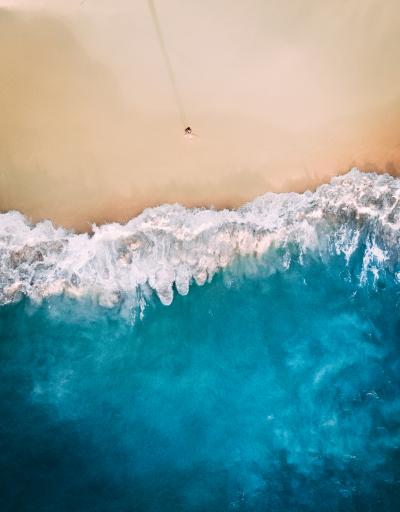 Aerial of waves on beach, Fisherman's Bay, Australia