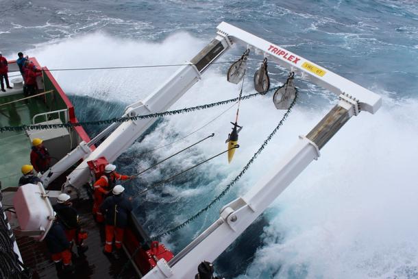 Ocean observers deploying an ocean glider. Image credit: S. Swart